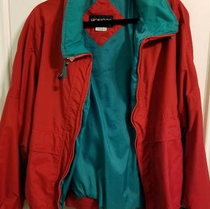 An Honors Vintage red and teal windbreaker.